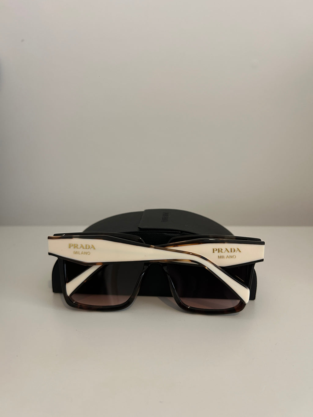 Prada PR 24ZS sunglasses in a tortoiseshell