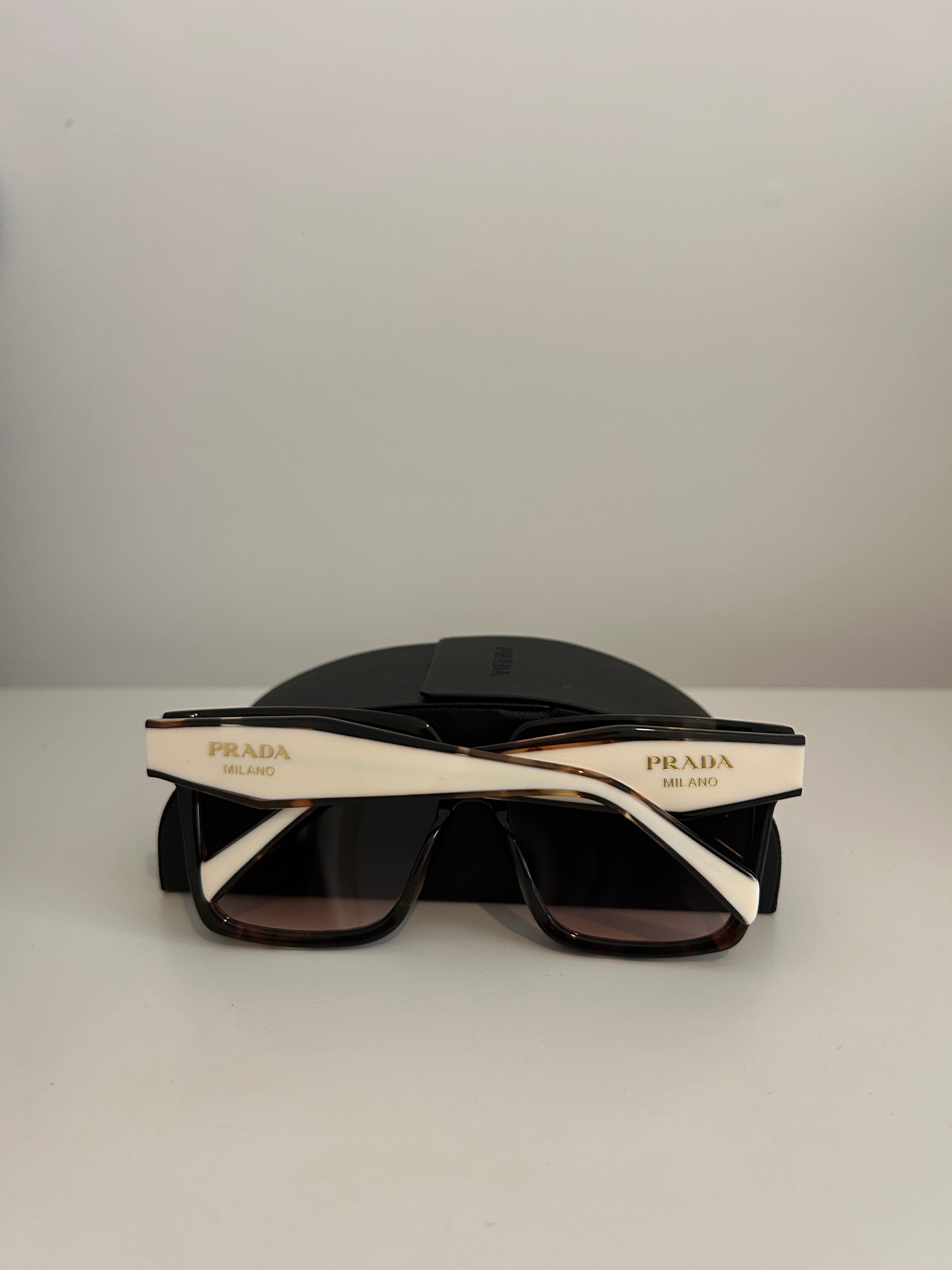 Prada PR 24ZS sunglasses in a tortoiseshell