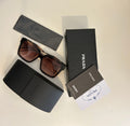 Prada PR 24ZS sunglasses in a tortoiseshell