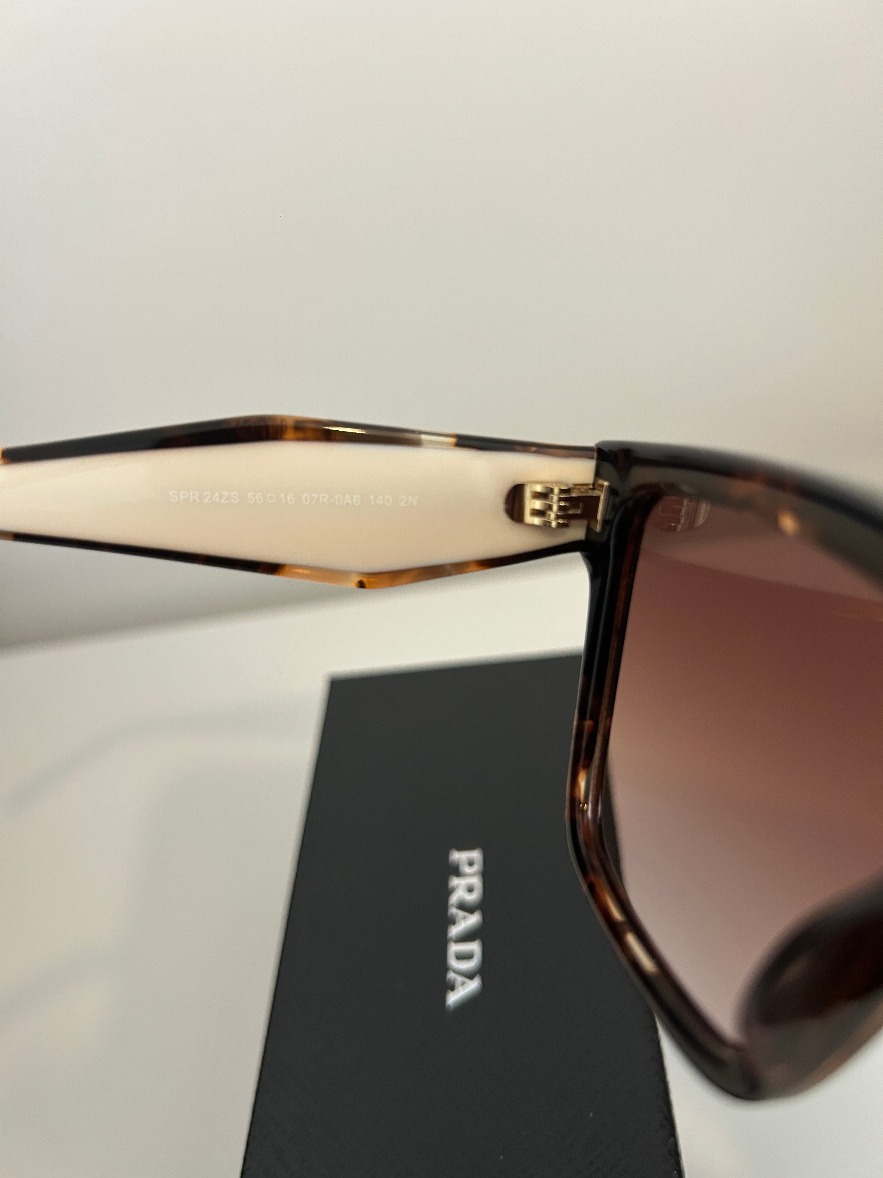 Prada PR 24ZS sunglasses in a tortoiseshell