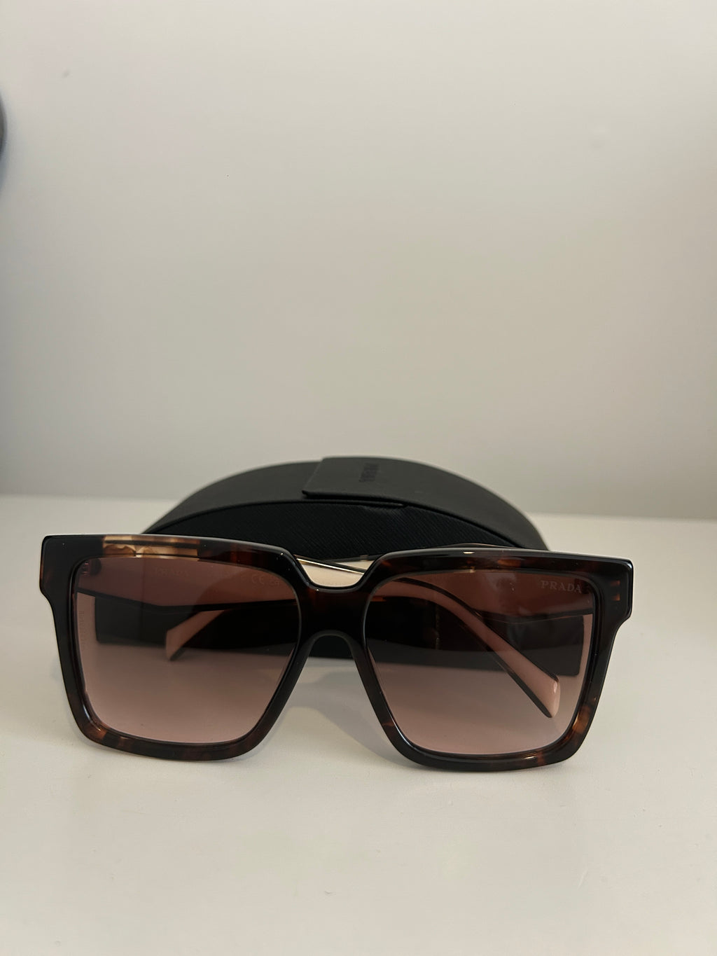 Prada PR 24ZS sunglasses in a tortoiseshell