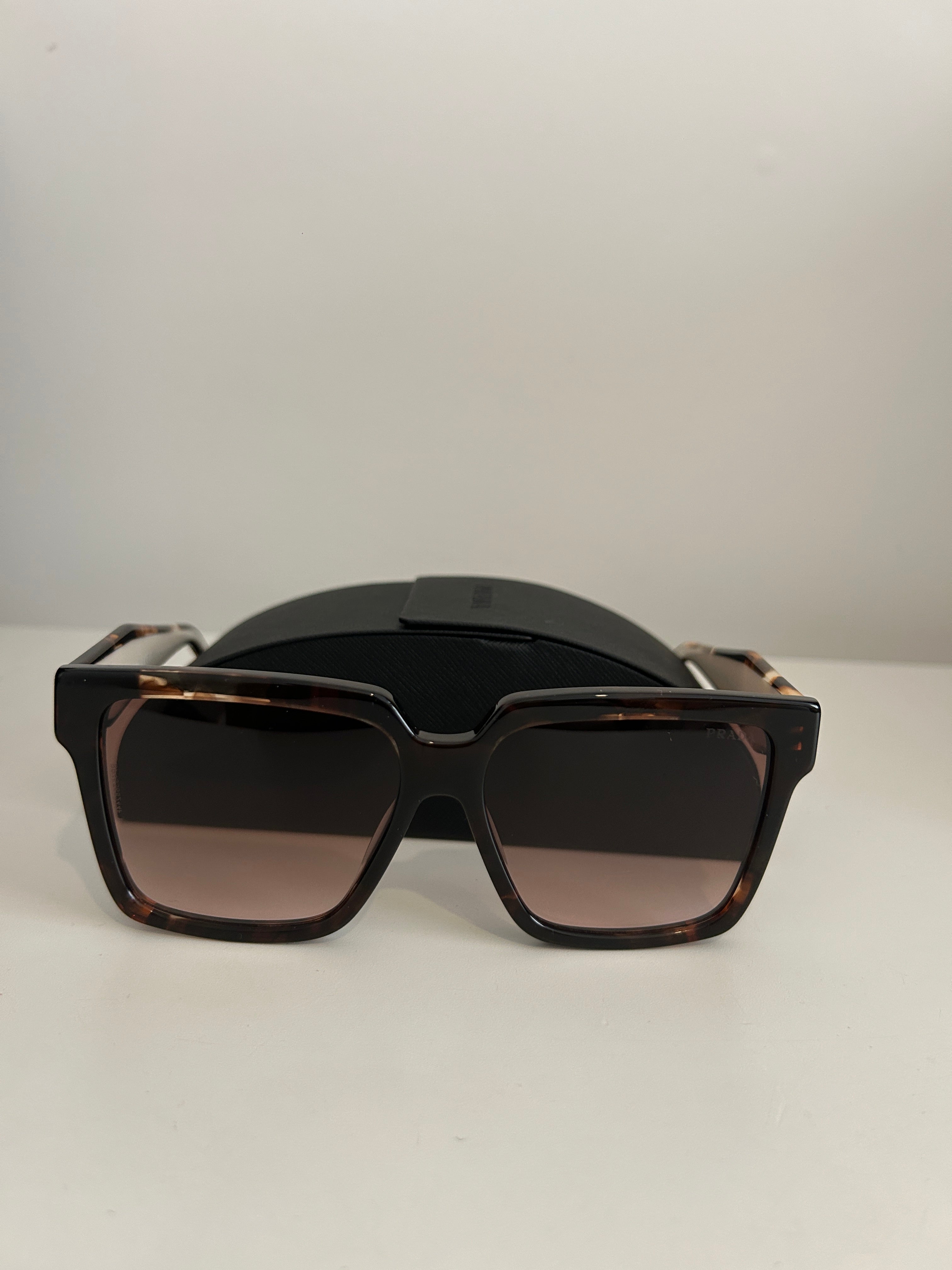 Prada PR 24ZS sunglasses in a tortoiseshell