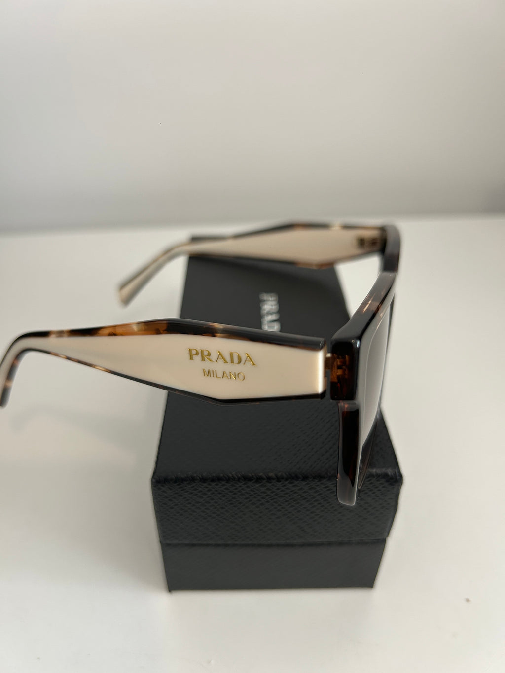 Prada PR 24ZS sunglasses in a tortoiseshell